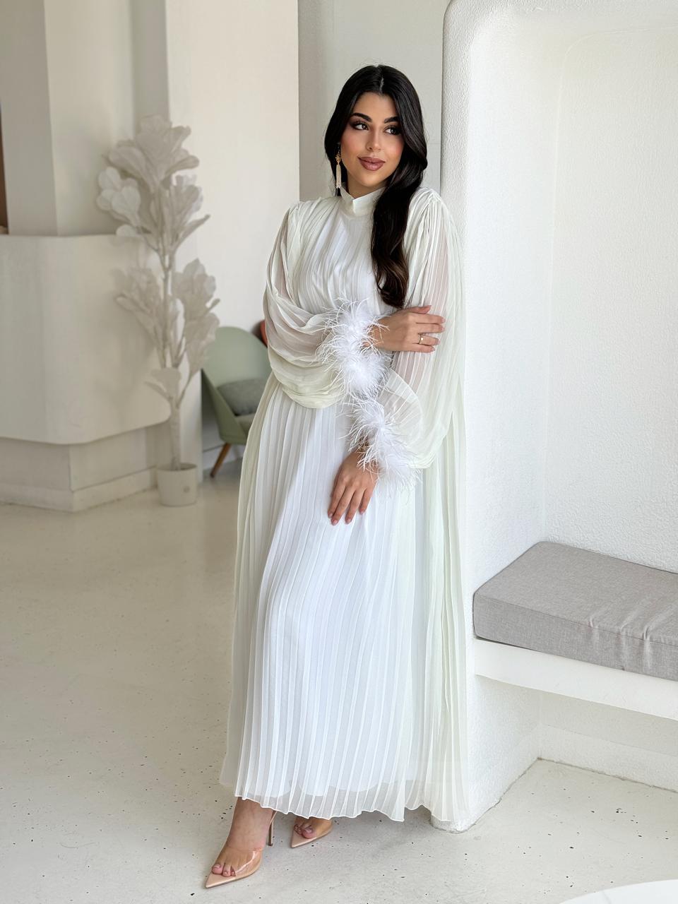 ivory feather-cuff pleated evening dress